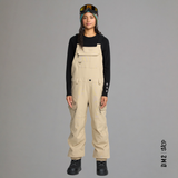salopette-snow-femme-creston-3d-bib-bone-isole-volcom-dm2-h25